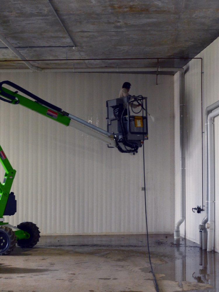 pressure cleaning from a boom lift